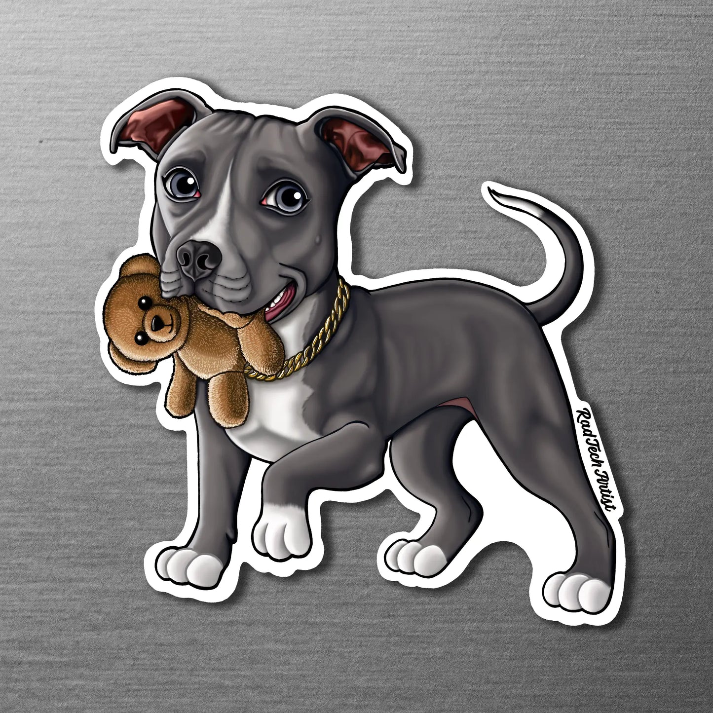 Magnet of a blue and white Pit Bull holding a teddy bear on a metallic surface