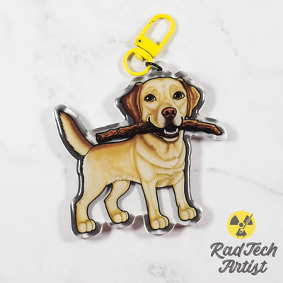 Yellow Labrador Retriever keychain with a yellow Lobster Clasp on a light gray background