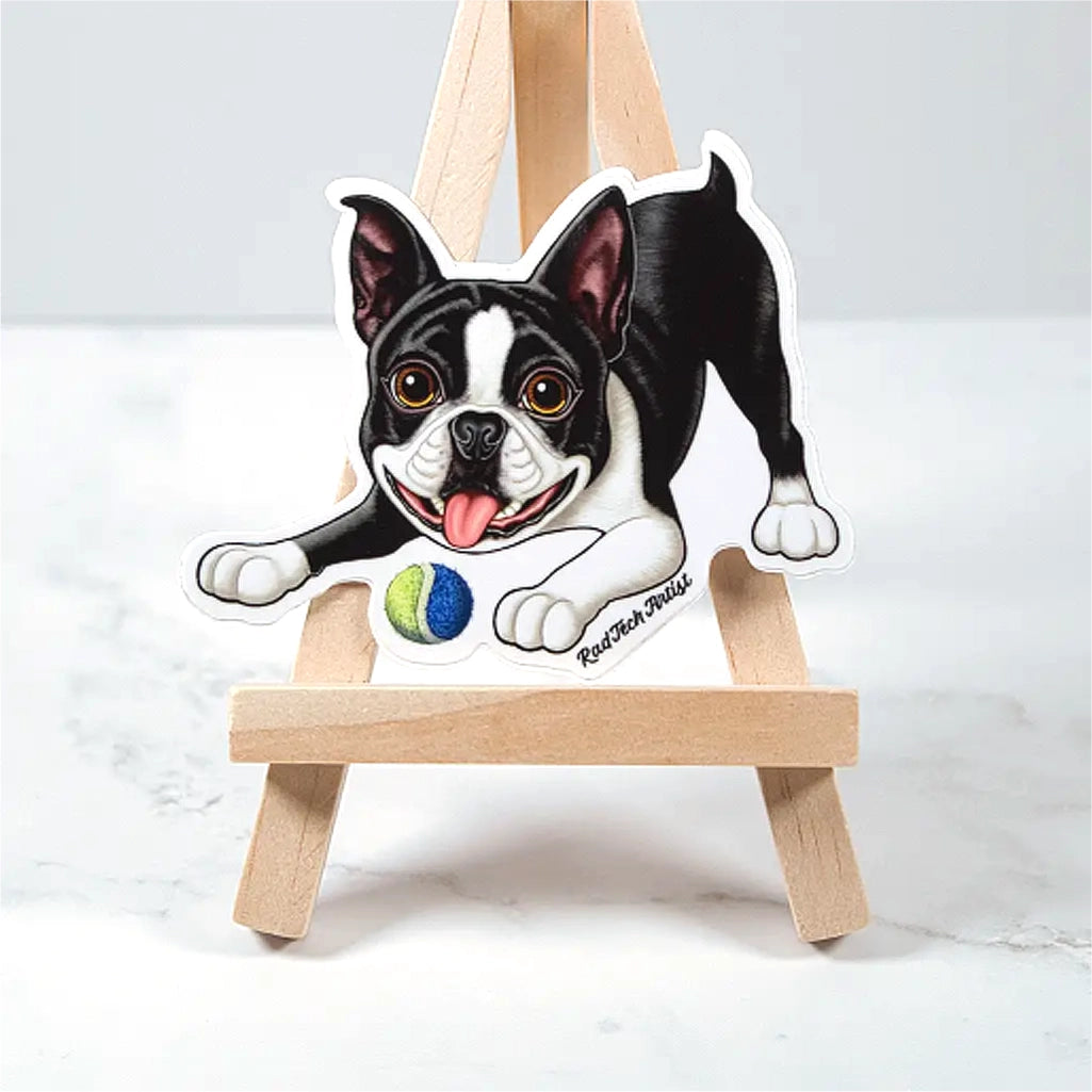 Sticker of a black and white Boston Terrier on a small wooden easel with a white background