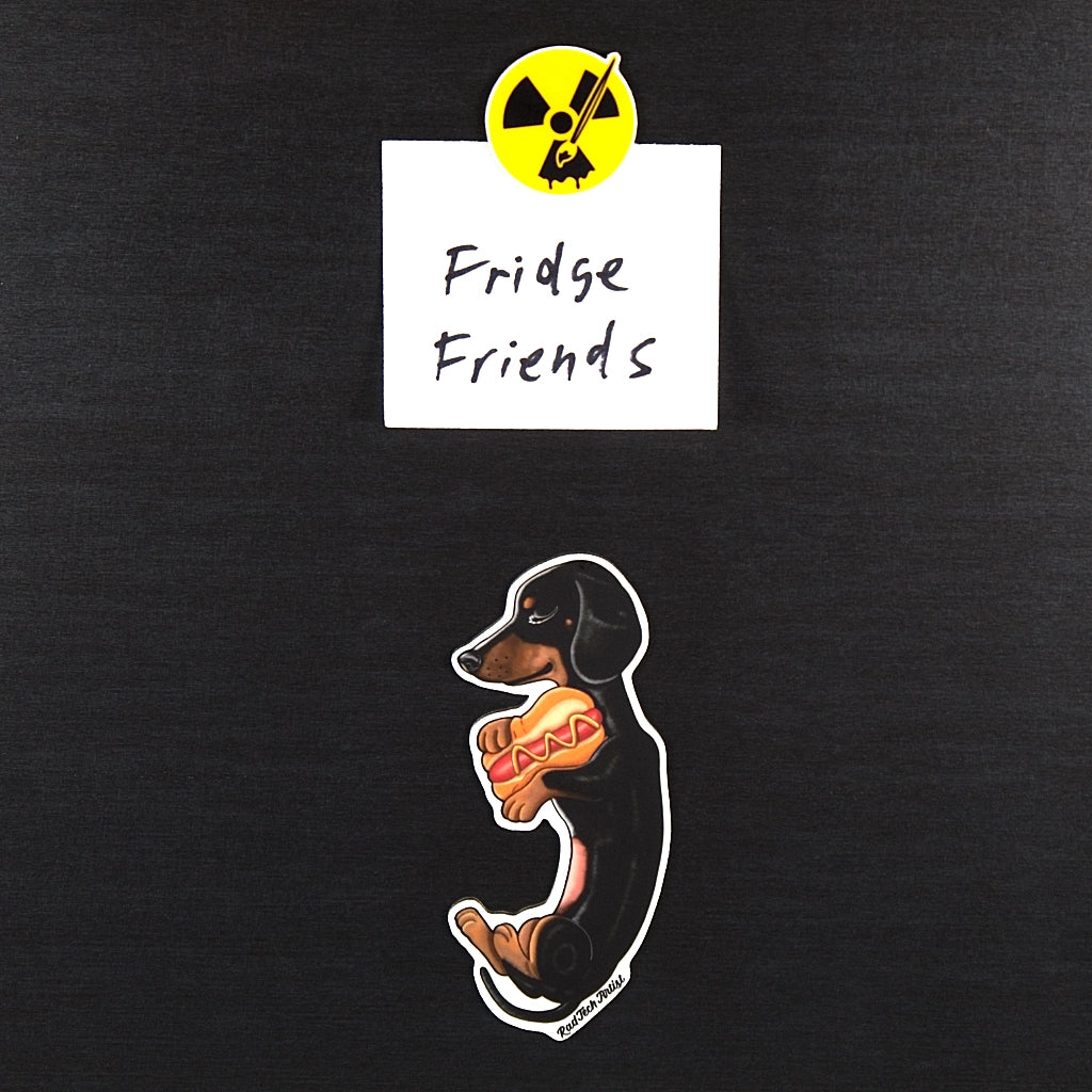 Magnet of a black and tan Dachshund holding a hotdog with 'Fridge Friends' text and radiation symbol above it on a black background.
