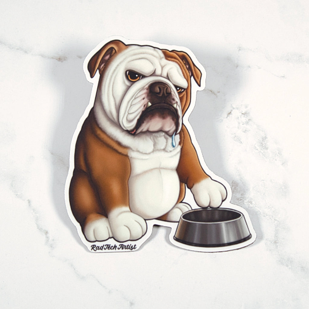 Magnet of a red and white English bulldog with a bowl on a marble surface