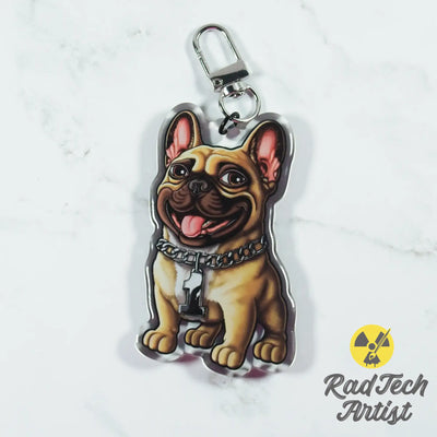 Keychain of a fawn French Bulldog design on a light gray background