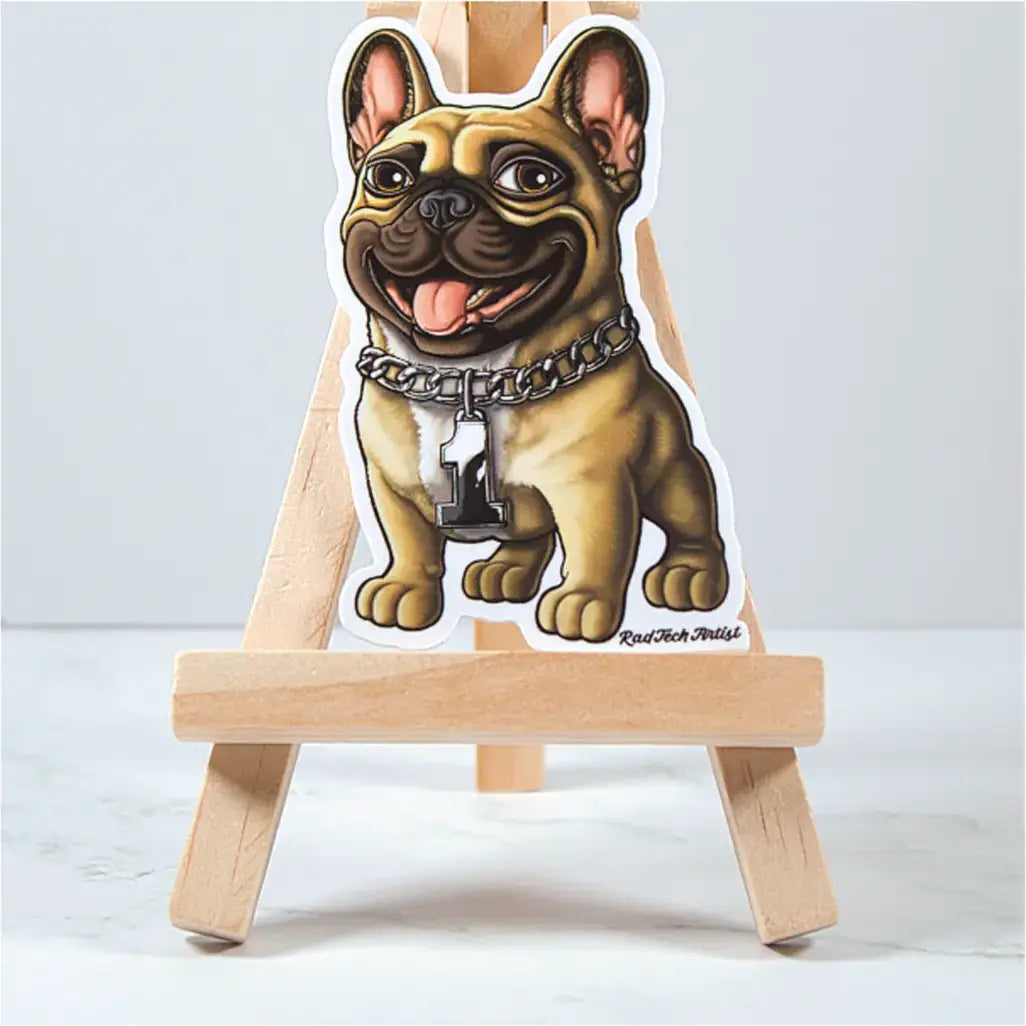 sticker of a fawn French Bulldog design on a small wooden easel against a light background