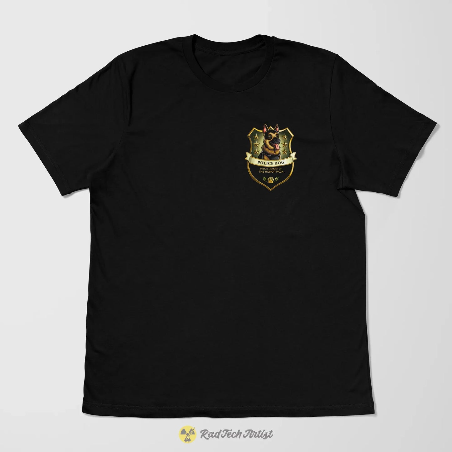 Black t-shirt laying flat with a gold and German Shepherd emblem on a white background