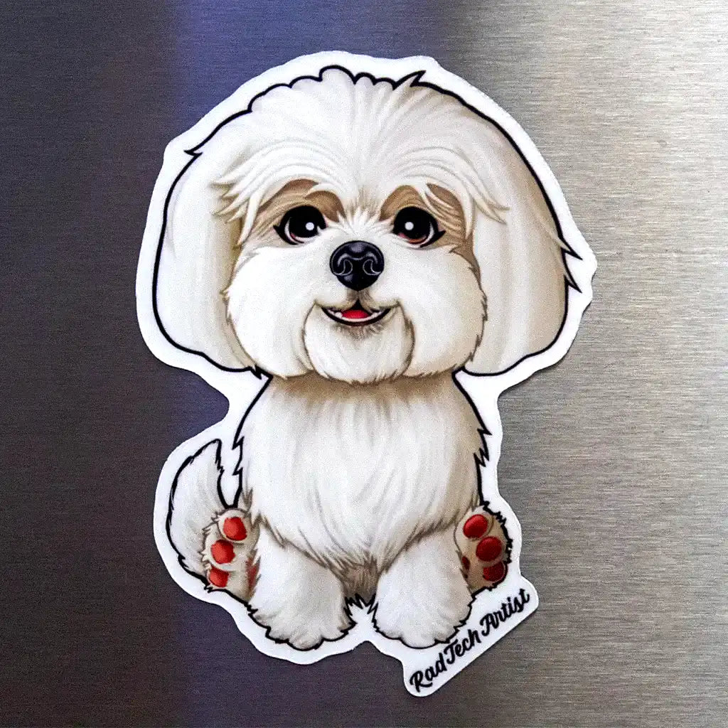 White Maltese dog magnet with fluffy coat displayed on a stainless steel fridge surface.