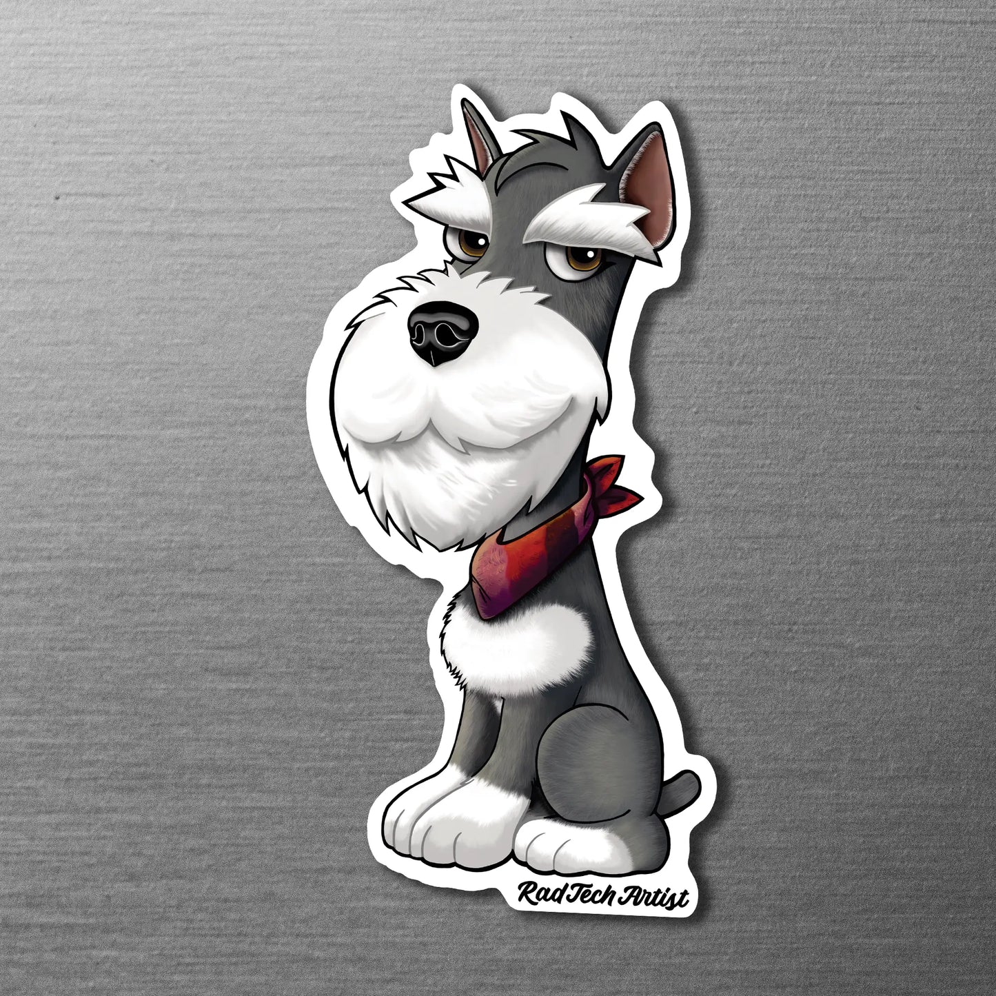 Magnet of a salt and pepper miniature schnauzer with a red bandana on a metallic surface