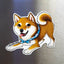 Shiba Inu dog magnet with red coat and blue bandana displayed on a stainless steel fridge surface.