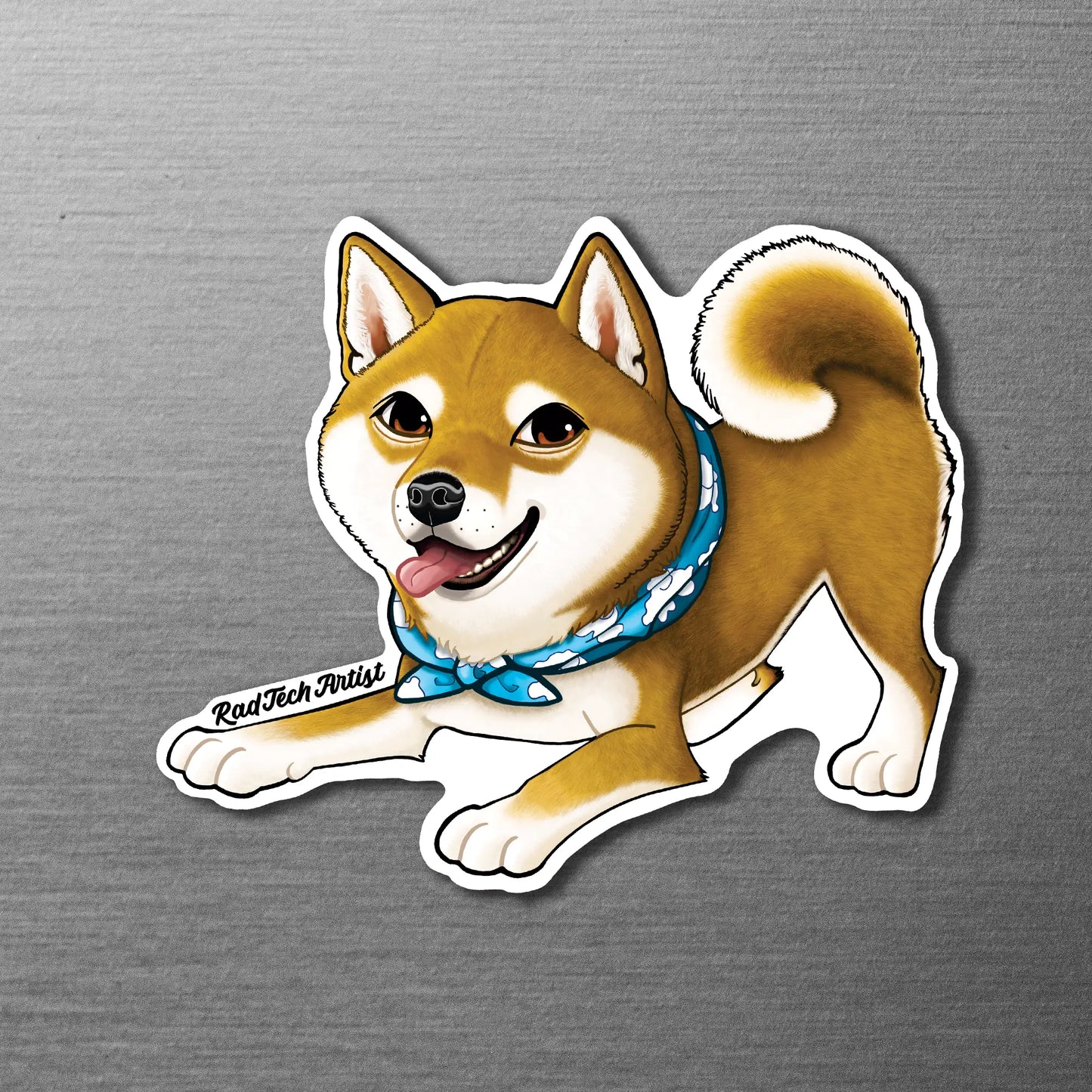 Magnet of red Shiba Inu with a blue bandana on a metallic surface