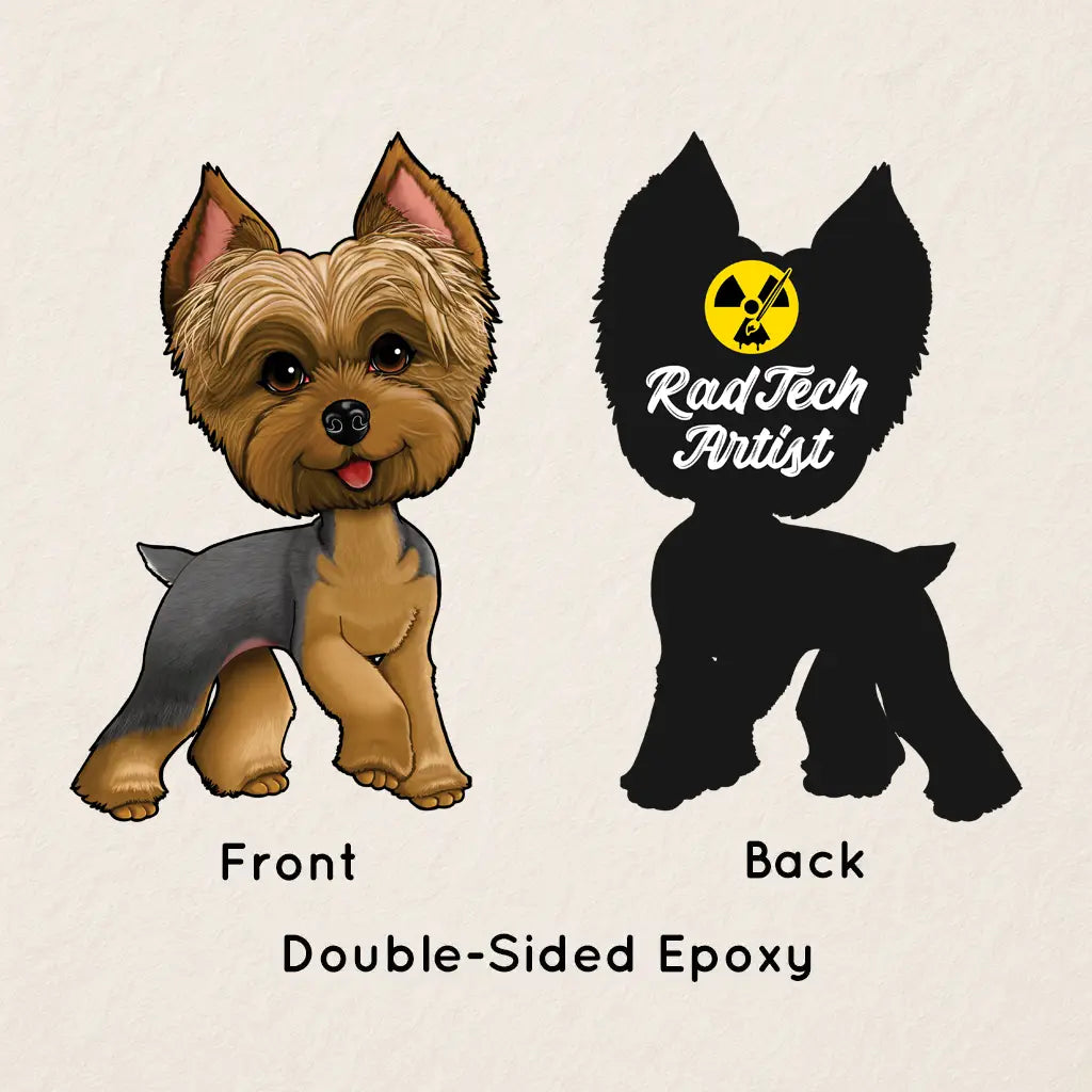 Front and back view of the blue and gold Yorkshire Terrier acrylic keychain with epoxy coating, featuring a detailed Yorkie with a playful expression on the front and the Rad Tech Artist logo on the back.